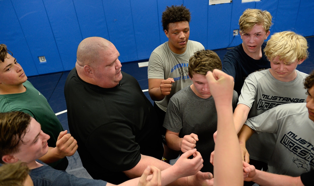 (Francisco Kjolseth  |  The Salt Lake Tribune)  Olympic wrestling champion Rulon Gardner wraps up an introductory clinic with young wrestlers at Herriman High School after being introduced as the new coach on Wed. May 17, 2018. Gardner a retired Greco-Roman wrestler won the gold medal in 2000 and the bronze in 2004. 