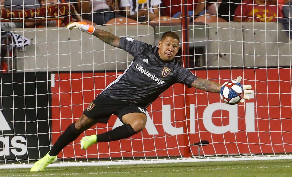 Real Salt Lake goalkeeper Nick Rimando makes a save against the Colorado Rapids during the first half of an MLS soccer match Saturday, Aug. 24, 2019, in Sandy, Utah. (AP Photo/Rick Bowmer)