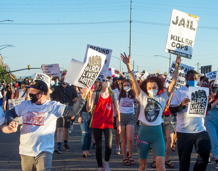 (Rick Egan  |  The Salt Lake Tribune)  Protesters  dance in downtown Salt Lake City, during the Dance Dance Revolution protest for racial equality, on Sunday, Aug. 9, 2020.