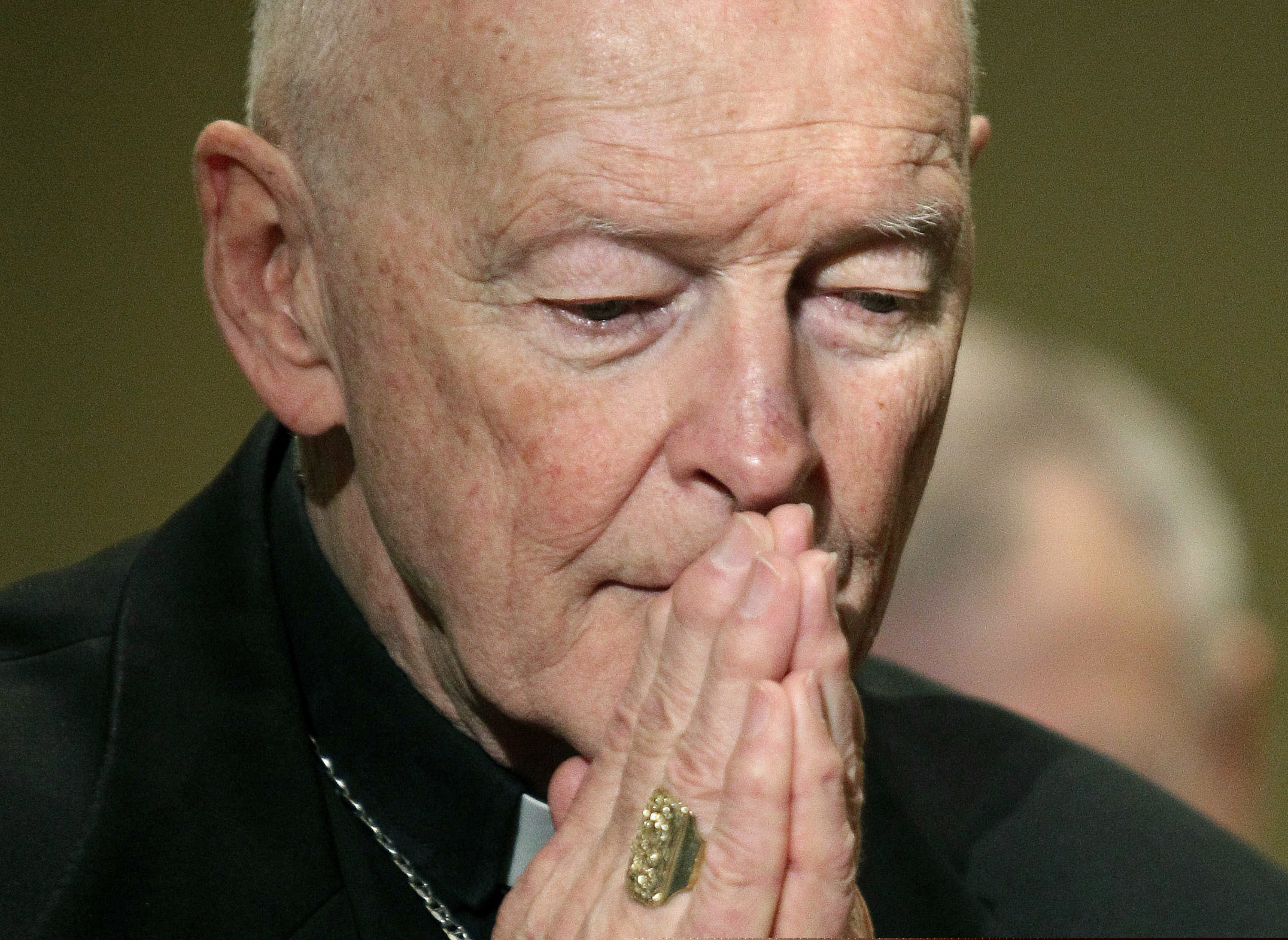 (Patrick Semansky, AP file photo) In this Nov. 14, 2011,photo, Cardinal Theodore McCarrick prays during the United States Conference of Catholic Bishops' annual fall assembly in Baltimore. On Tuesday, Nov. 10, 2020, the Vatican took the extraordinary step of publishing its two-year investigation into the disgraced ex-Cardinal McCarrick, who was defrocked in 2019 after the Vatican determined that years of rumors that he was a sexual predator were true.