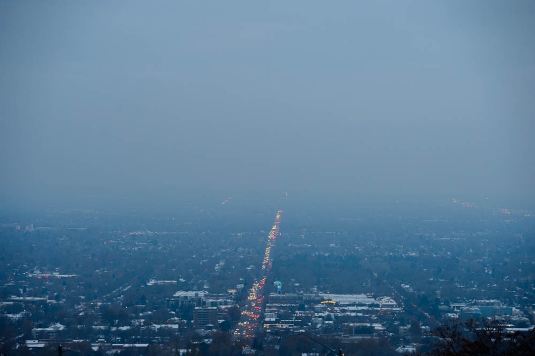(Trent Nelson | The Salt Lake Tribune)  Lights and traffic along 700 East in Salt Lake City at the end of a hazy day, Thursday Dec. 6, 2018.