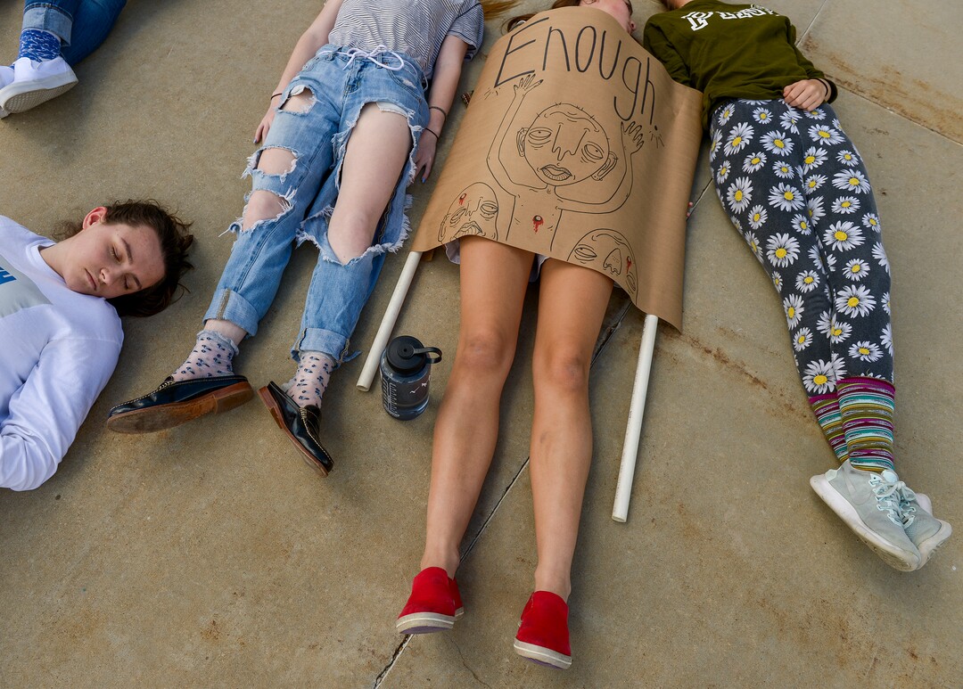 (Leah Hogsten  |  The Salt Lake Tribune) West High School students participate in the 22-minute die-in for the 22 school shootings already in 2018.  Members of March For Our Lives SLC members and concerned citizens gather at the Utah Capitol, Friday, May 18, 2018, to demand gun reform and honor the 10 dead who were killed during Friday morning's shooting spree inside Santa Fe High School in southeast Texas.