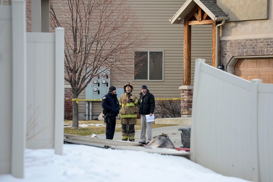 (Leah Hogsten  |  The Salt Lake Tribune) Weber County emergency personnel and firefighters work the scene of a small, private plane that crashed in a residential neighborhood in Roy, Jan. 15, 2020.  A 64-year-old pilot was killed.