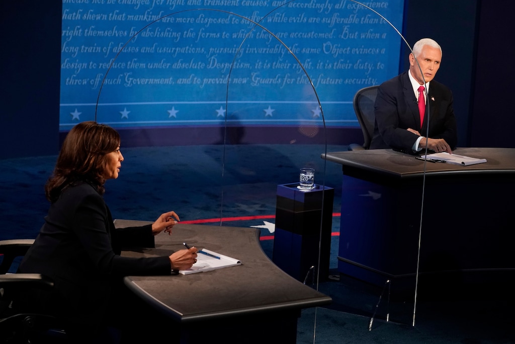 (Morry Gash | AP) Democratic vice presidential candidate Sen. Kamala Harris, D-Calif., and Vice President Mike Pence answer questions during the vice presidential debate Wednesday, Oct. 7, 2020, at Kingsbury Hall on the campus of the University of Utah in Salt Lake City.
