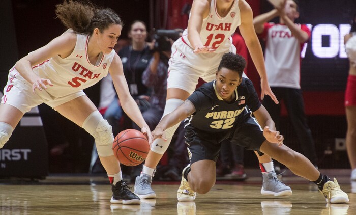 (Rick Egan  |  The Salt Lake Tribune)  Utah Utes center Megan Huff (5) steals the ball from Purdue Boilermakers forward Ae'Rianna Harris (32), in basketball action Utah Utes vs. Purdue Boilermakers, at the Jon M. Huntsman Center, Monday, November 20, 2017.