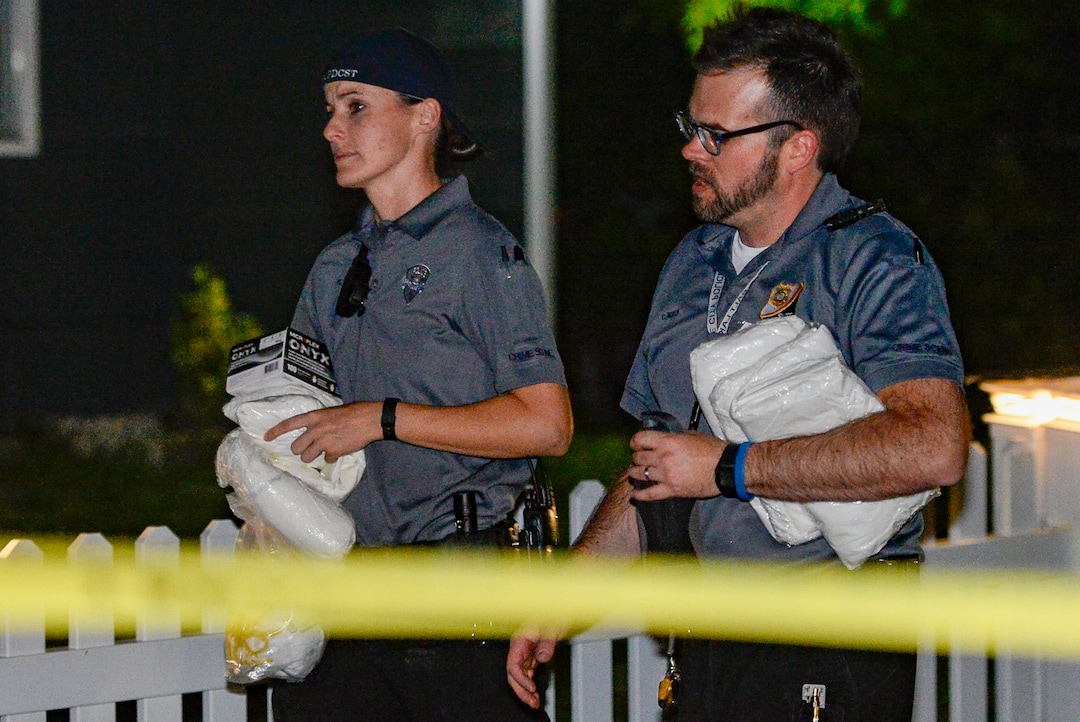 (Francisco Kjolseth  |  The Salt Lake Tribune)  Police investigators search a home at 547 N. 1000 West in Salt Lake City as part of the disappearance of University of Utah student MacKenzie Lueck on Wed. June 26, 2019.