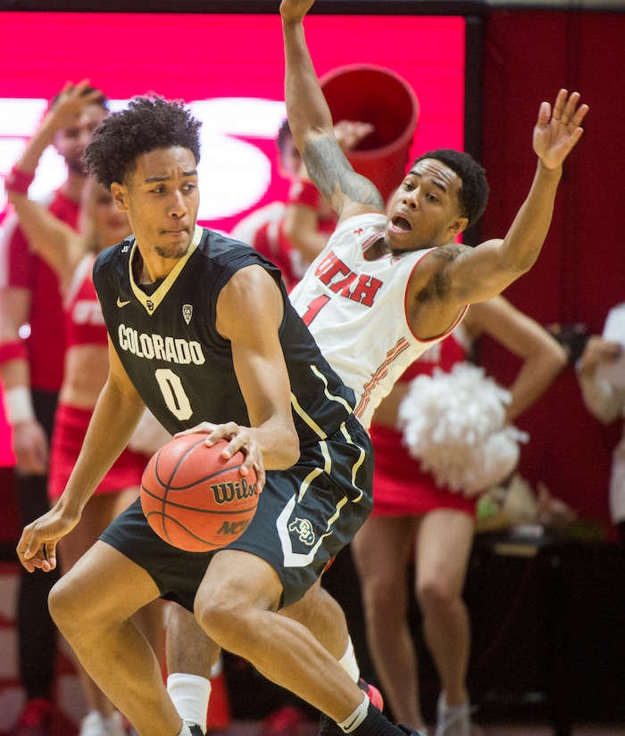 (Rick Egan  |  The Salt Lake Tribune)  Colorado Buffaloes guard D'Shawn Schwartz (0) collides with Utah Utes guard Justin Bibbins (1), in PAC-12 basketball action between Utah Utes and Colorado Buffaloes, at the Jon M. Huntsman Center, Saturday, March 3, 2018.
