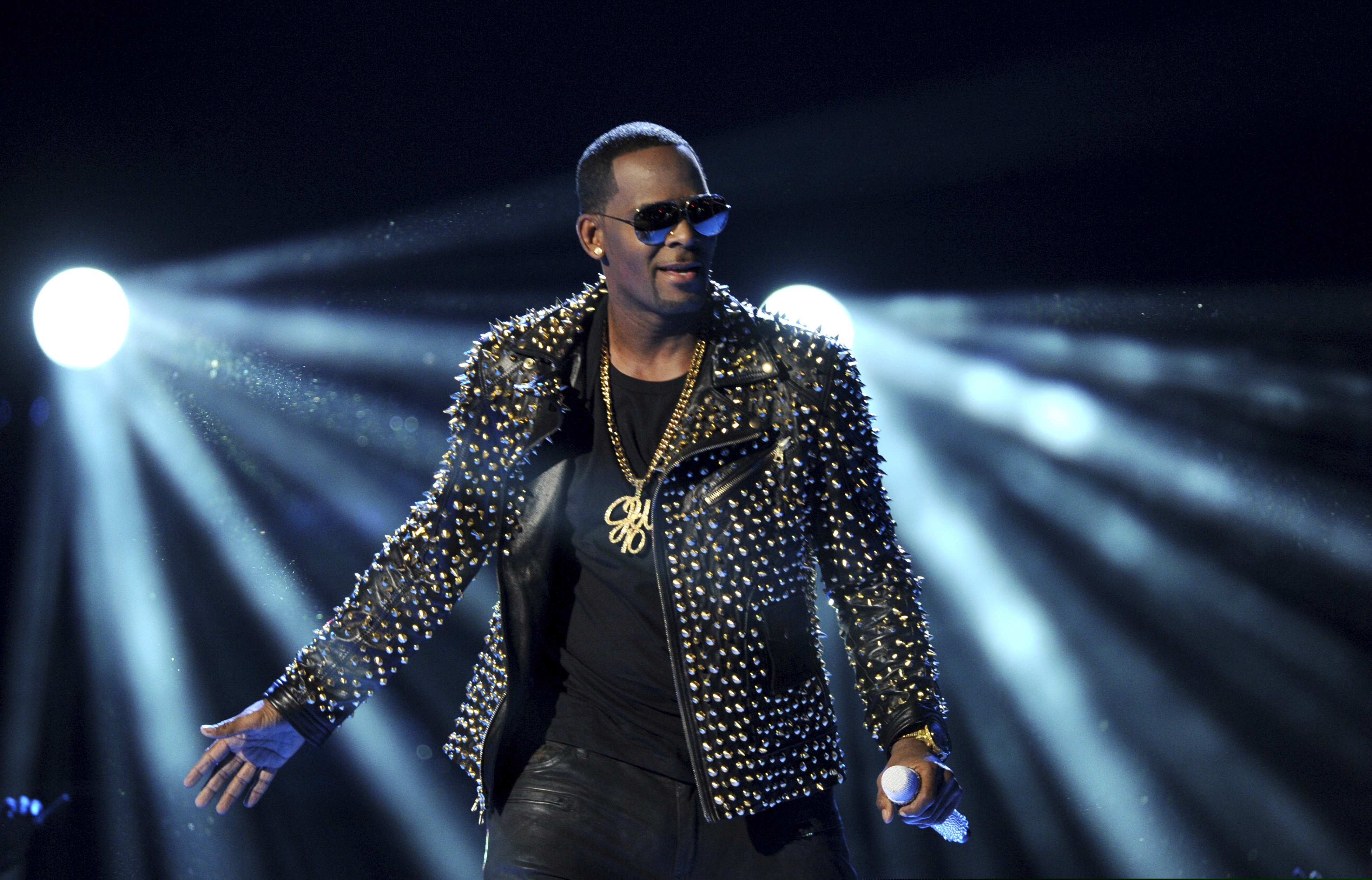 (Photo by Frank Micelotta/Invision/AP, File) In this June 30, 2013 file photo, R. Kelly performs at the BET Awards at the Nokia Theatre in Los Angeles. R. Kelly is announcing a new tour, but it won't be in the United States. The embattled entertainer announced on social media Tuesday, Feb. 5, 2019, that he'll be going to Australia, New Zealand and Sri Lanka.
