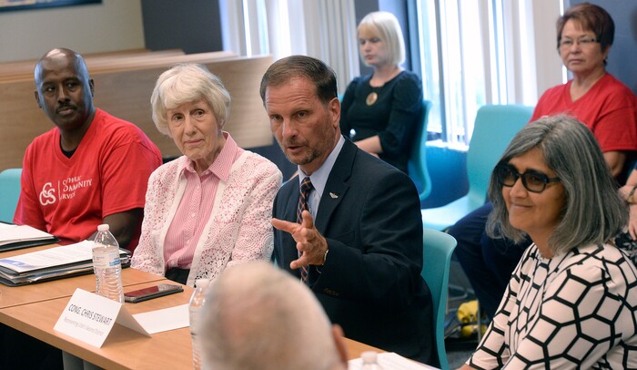 (Al Hartmann | The Salt Lake Tribune)
Rep. Chris Stewart, center, holds a roundtable discussion with refugees and local agencies at Salt Lake Community College's Medowbrook campus in South Salt Lake Tuesday August 22. Aden Batar, Catholic Community Services and Pamela Atkinson, community advocate, left, and Ashe Parekh with the Refugees Service office, right.