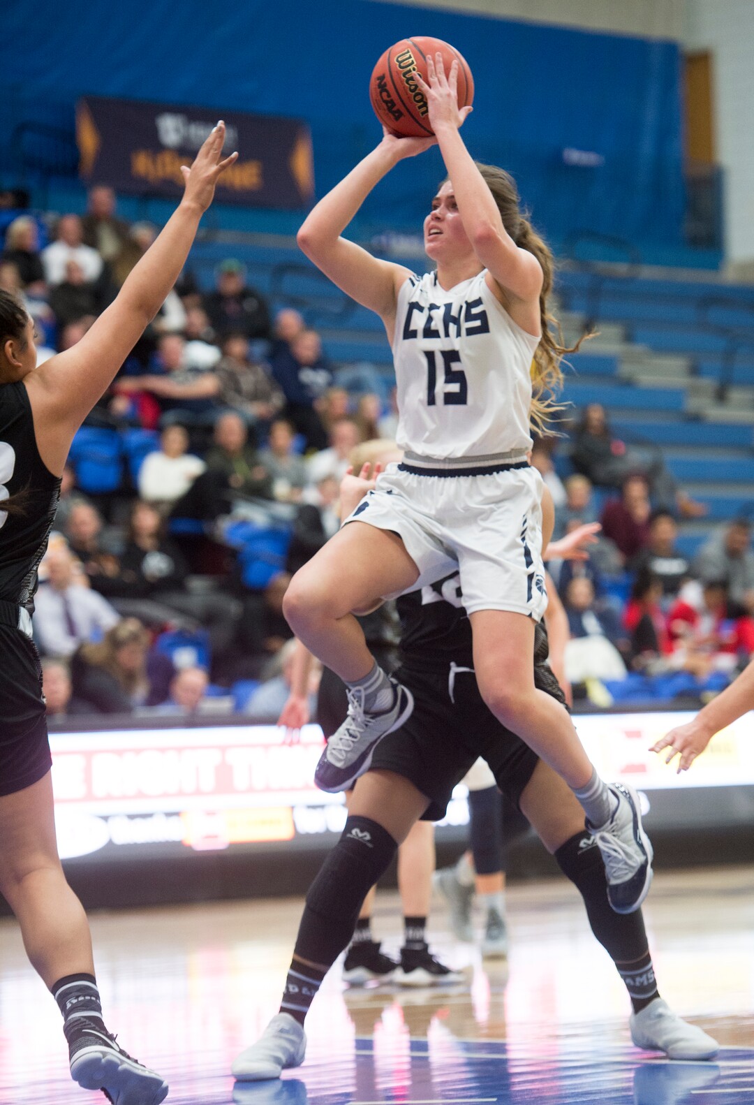 (Rick Egan  |  The Salt Lake Tribune)   Kemery Martin (15) Corner Canyon, takes a shot for the Chargers, in Class 5A women's basketball playoff game between Corner Canyon and Highland, Monday, Feb. 19, 2018.