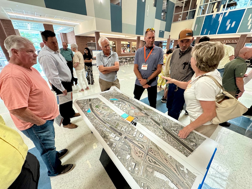 (Mark Eddington | The Salt Lake Tribune) St. George residents examine the preliminary design of the Utah Department of Transportation $195 million improvement project at Dixie Middle School. on Wednesday, June 25, 2025.