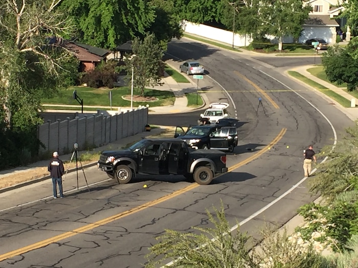 Luke Ramseth | The Salt Lake Tribune
A man in this black pickup rammed an SUV, shown behind the truck, before he exited and opened fire on the SUV on Sandy’s Alta Canyon Drive on Tuesday, June 6, 2017.
