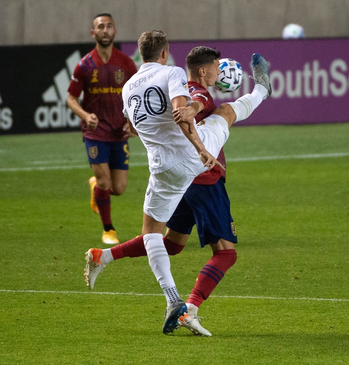 (Francisco Kjolseth  |  The Salt Lake Tribune) Los Angeles Galaxy forward Nick DePuy (20) goes for a high kick past Real Salt Lake midfielder Damir Kreilach (8) as Real Salt Lake hosts L.A. Galaxy at Rio Tinto Stadium in Sandy on Wednesday, Sept. 23, 2020.