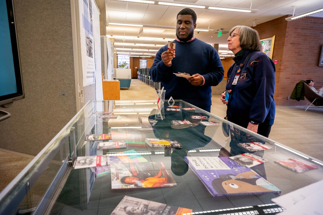 (Trent Nelson  |  The Salt Lake Tribune) Meligha Garfield, director of the Black Cultural Center at the University of Utah, and Joan Gregory look over an interactive exhibit highlighting six figures in African American history at the U.'s Eccles Health Sciences Library in Salt Lake City on Thursday, Feb. 20, 2020.