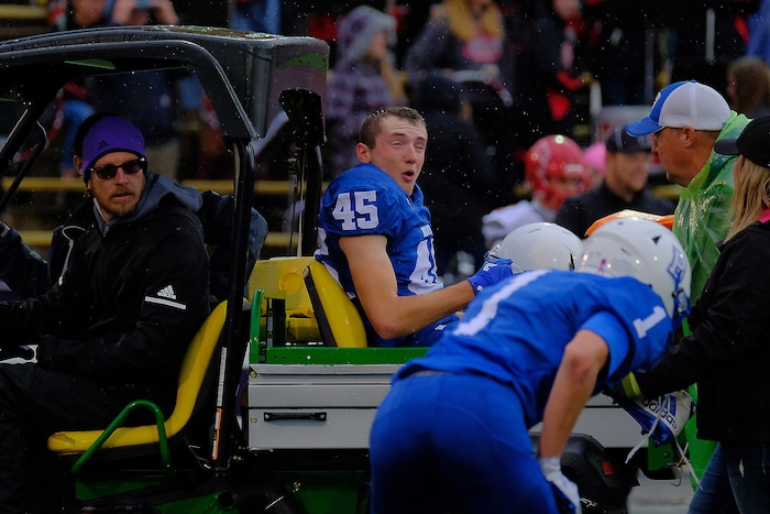 (Leah Hogsten  |  The Salt Lake Tribune) Cole Marshall yells encouragement to his teammates as he leaves the field with an injured ankle.  Beaver High School boys' football team defeated Delta High School 35-16 during their class 2A state semifinal football game Saturday, November 4, 2017 at Weber State University's Stewart Stadium.