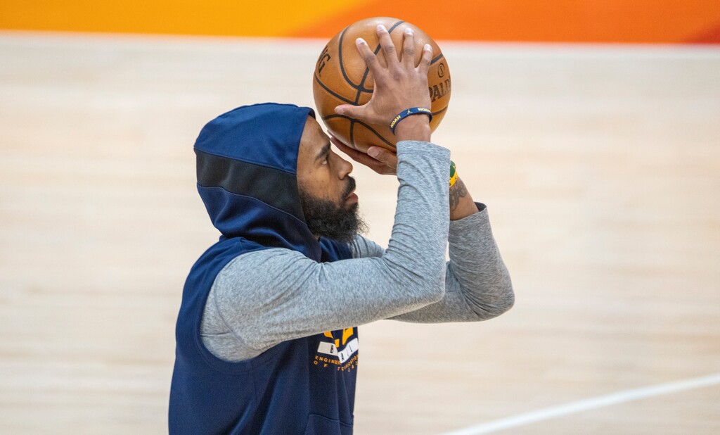 (Rick Egan | The Salt Lake Tribune) Utah Jazz guard Mike Conley (10) takes some shots, during the pre-game warm-up, before game one in the NBA playoff series between the Utah Jazz and the LA Clippers, at Vivint Arena, on Tuesday, June 8, 2021.