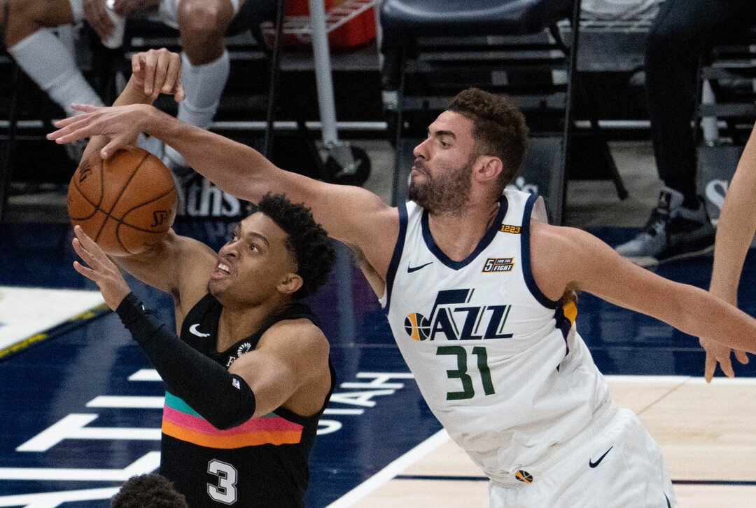 (Francisco Kjolseth | The Salt Lake Tribune) San Antonio Spurs forward Keldon Johnson (3) is pressured by Utah Jazz forward Georges Niang (31) in NBA action between the Utah Jazz and the San Antonio Spurs at Vivint Smart Home Arena, on Wednesday, May 5, 2021.