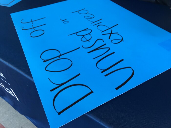 (Courtney Tanner | The Salt Lake Tribune) St. Mark's Hospital volunteers make posters for an opioid and prescription medication drop off event on Saturday, Sept. 7, 2019.