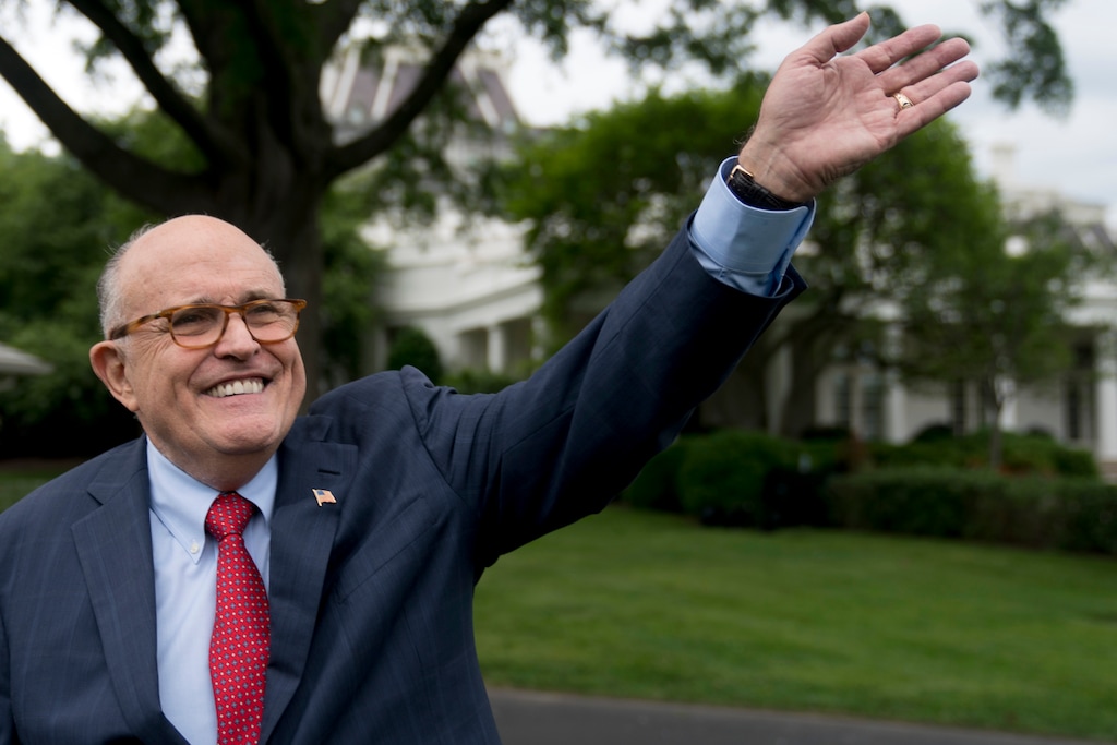 (Andrew Harnik | AP file photo) Rudy Giuliani, an attorney for President Donald Trump, waves to people during White House Sports and Fitness Day on the South Lawn of the White House, in Washington on May 29, 2018.