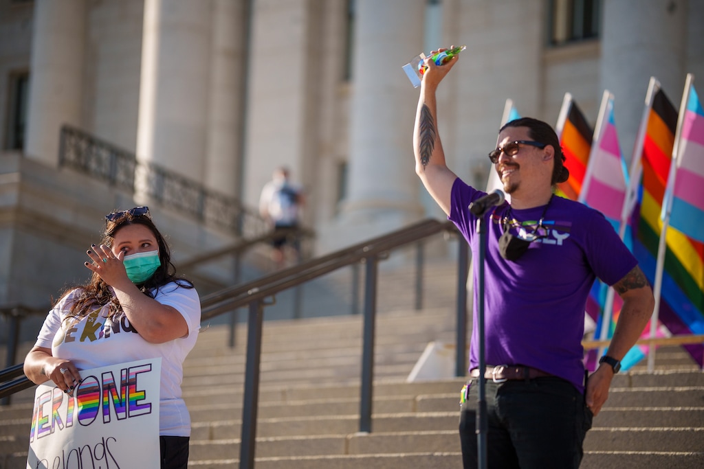 (Trent Nelson | The Salt Lake Tribune) Horizon Elementary School teacher Sarah Paul wipes a tear from her eye as John Arthur presents her with the F.A.M. Educator of the Year Award during a rally at the state Capitol in Salt Lake City on Tuesday, May 18, 2021. Friends, Allies and Mentors of the LGBTQ+ Community is a nonprofit organization created by educators.