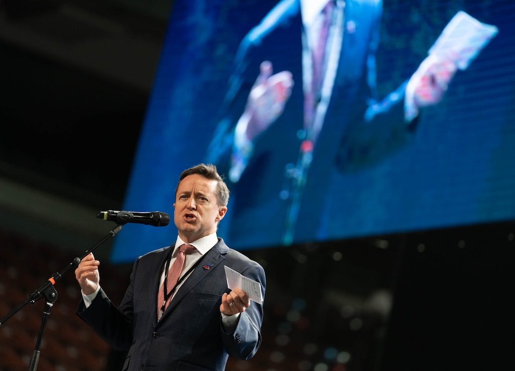 (Francisco Kjolseth | The Salt Lake Tribune) Outgoing Utah Republican Party Chair Derek Brown runs the show during the Utah Republican Party’s 2021 Organizing Convention at the Maverik Center in West Valley City on Saturday, May 1, 2021. Brown is running for Utah attorney general in 2024.