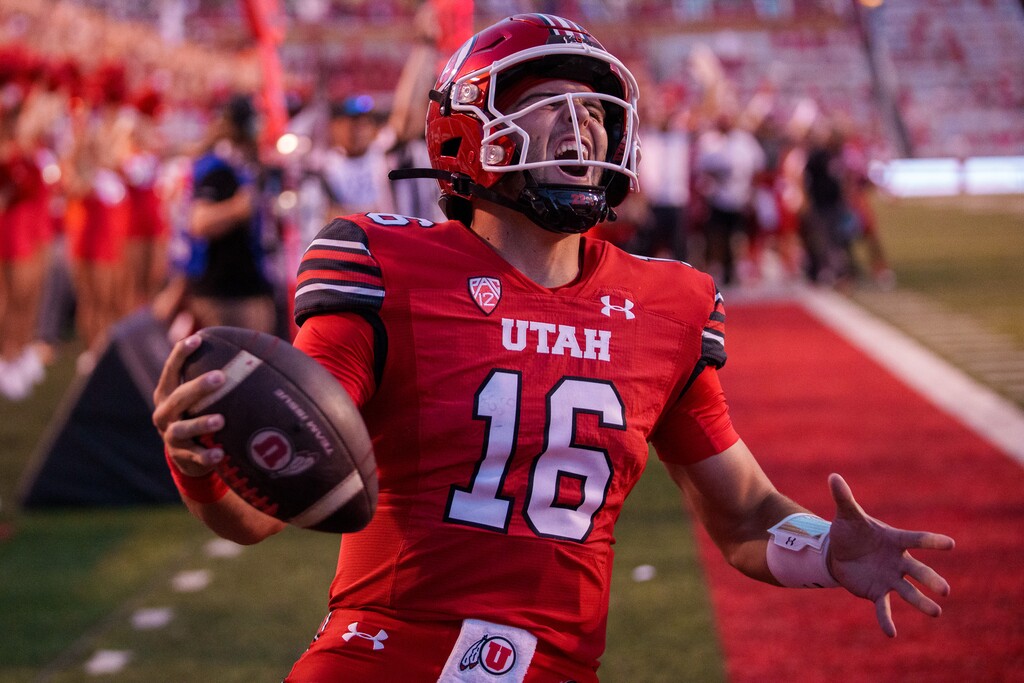 (Trent Nelson | The Salt Lake Tribune) Utah Utes quarterback Bryson Barnes (16) scores a touchdown as the Utah Utes host the Florida Gators, NCAA football in Salt Lake City on Thursday, Aug. 31, 2023.