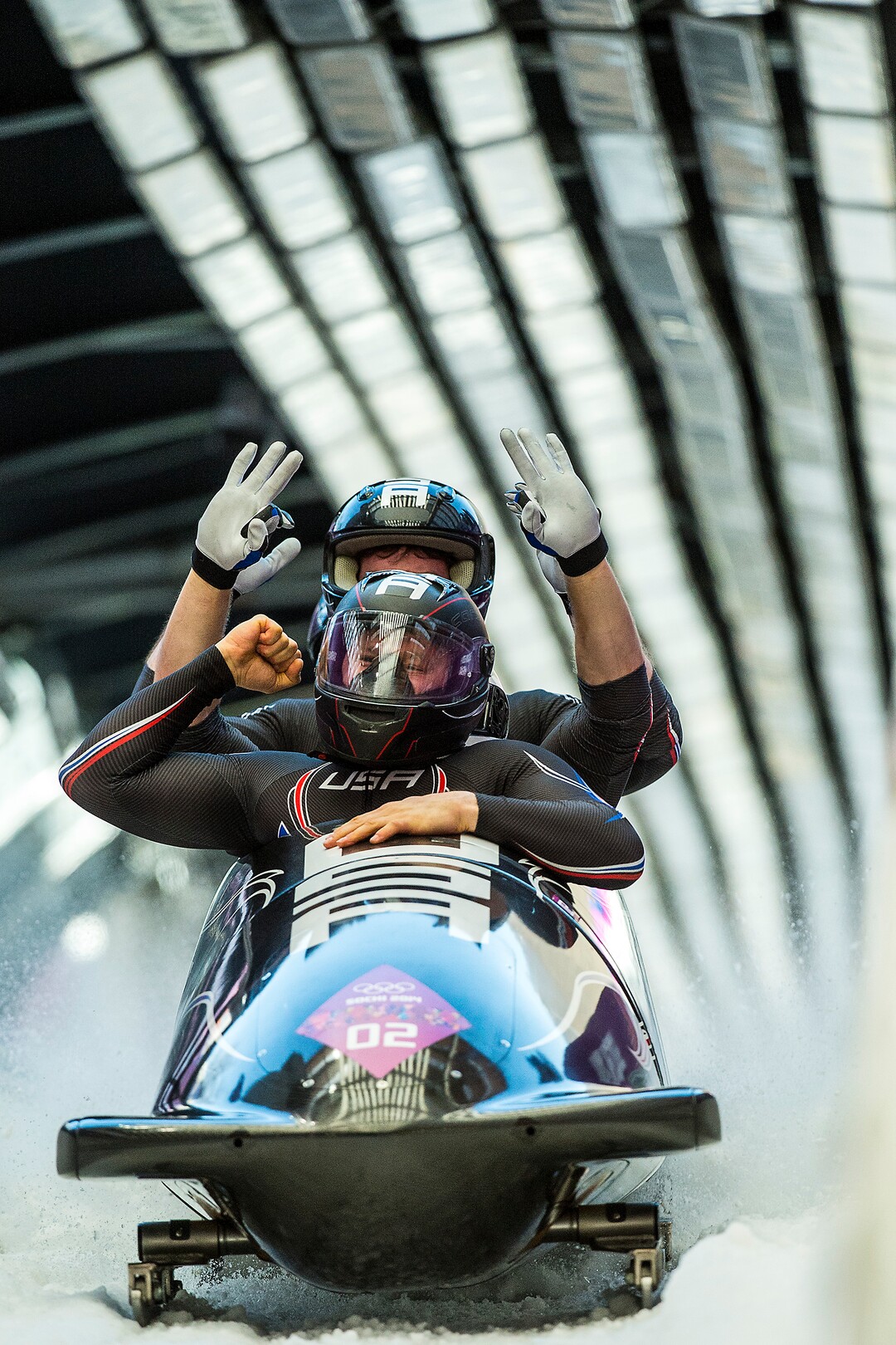 KRASNAYA POLYANA, RUSSIA  - JANUARY 23:Night Train 2, piloted by Steven Holcomb and pushed by Chris Fogt, Curtis Tomasevicz, Steve Langton, celebrate at the finish of the four-man bobsled at Sanki Sliding Center during the 2014 Sochi Olympics Sunday February 23, 2014. The team won the bronze medal with a cumulative time of 3:40.99. (Photo by Chris Detrick/The Salt Lake Tribune)