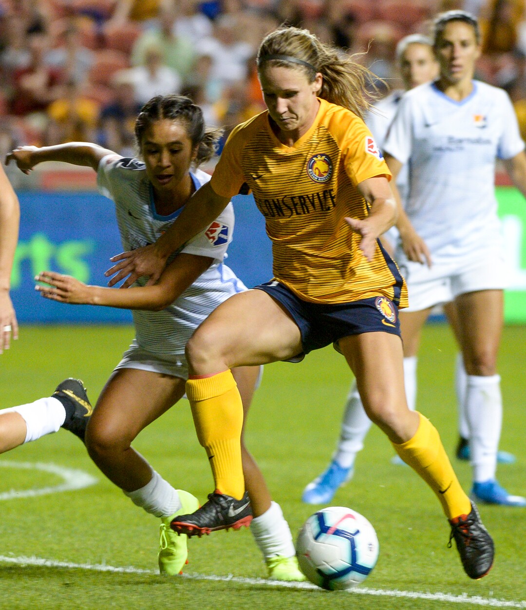 (Leah Hogsten  |  The Salt Lake Tribune) Utah Royals FC forward Mallory Weber (20) and Sky Blue FC defender Caprice Dydasco (3) fight for possession as the Utah Royals FC host Sky Blue FC, August 7, 2019 at Rio Tinto Stadium.