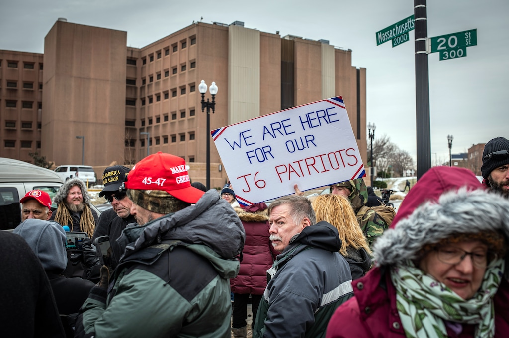 (Graham Dickie | The New York Times) Supporters gather on Tuesday, Jan. 21, 2025, outside the District of Columbia Detention Facility, the local jail in Washington, as they await the release of people charged in connection with the attack on the Capitol on Jan. 6, 2021.