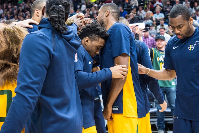 (Chris Detrick  |  The Salt Lake Tribune) Utah Jazz guard Donovan Mitchell (45) huddles with his teammates before  the game at Vivint Smart Home Arena Thursday, March 15, 2018.