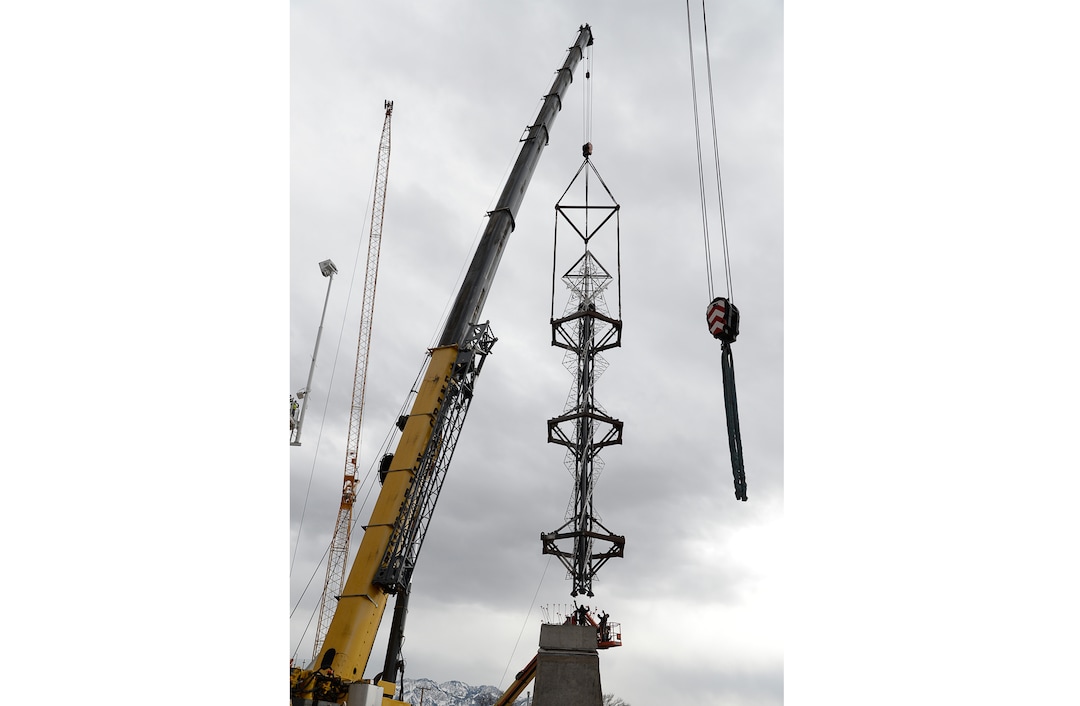 (Francisco Kjolseth  |  The Salt Lake Tribune) The Olympic cauldron is returned to the University of Utah on Friday, Jan. 29, 2021, after a refurbishment to lengthen its life span. Removed in February 2020, the cauldron was transported to an off-site location, where all 738 glass panes were removed and the complete structure was sandblasted and refinished. The refurbished structure was placed on a newly constructed, 17-foot-tall pedestal, just north of the stadium ticket office, with plans to add high-quality glass.