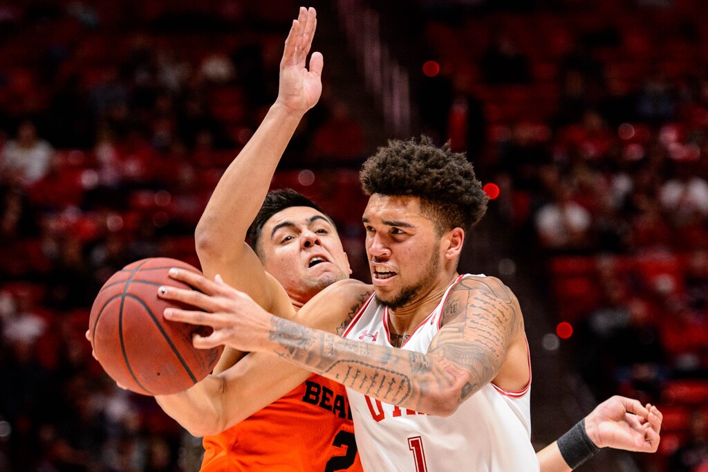 (Trent Nelson  |  The Salt Lake Tribune) Utah Utes forward Timmy Allen (1) drives on Oregon State Beavers guard Jarod Lucas (2) as the University of Utah hosts Oregon State, NCAA men's basketball in Salt Lake City on Thursday, Jan. 2, 2020.