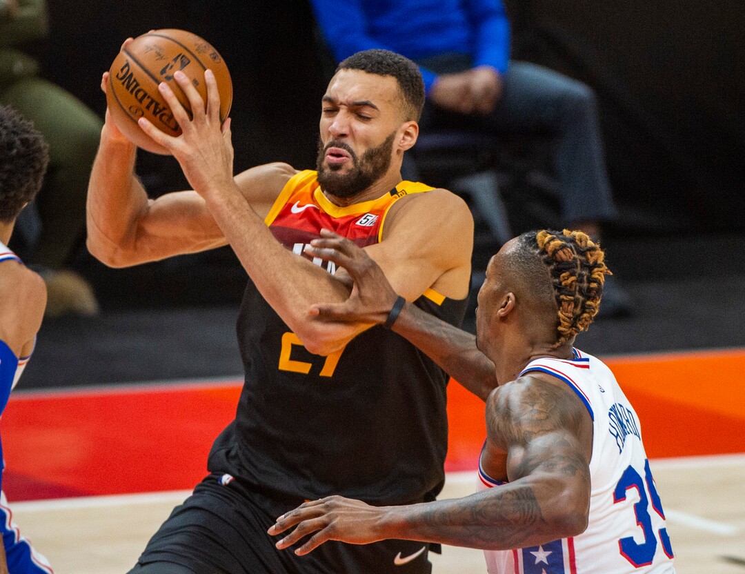 (Rick Egan | The Salt Lake Tribune) Utah Jazz center Rudy Gobert (27) is fouled by Philadelphia 76ers center Dwight Howard (39), in NBA action between the Utah Jazz and the Philadelphia 76ers at Vivint Arena, on Monday, Feb. 15, 2021.