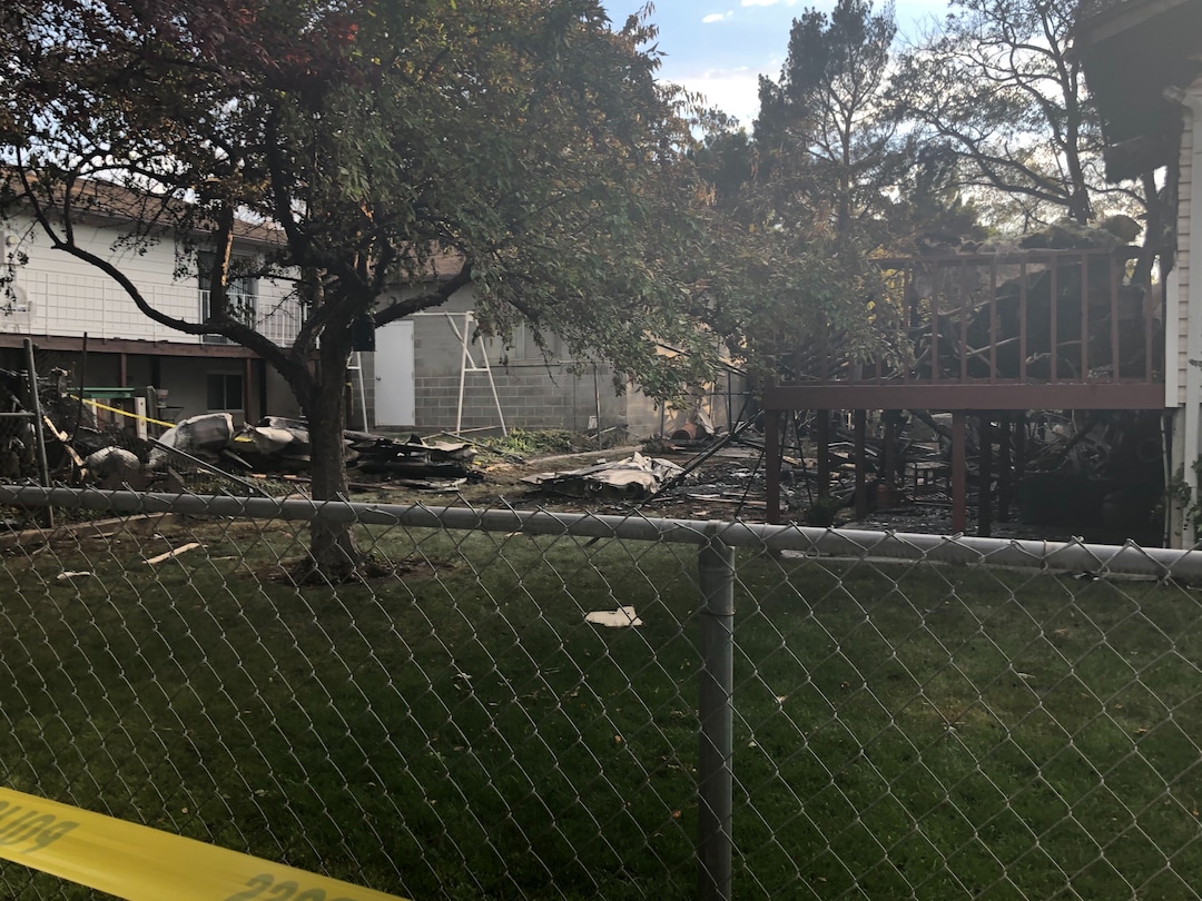 (Sydney Glenn | FOX 13) The crash site where a small plane with six passengers hit a home in West Jordan on Saturday, July 25, 2020.