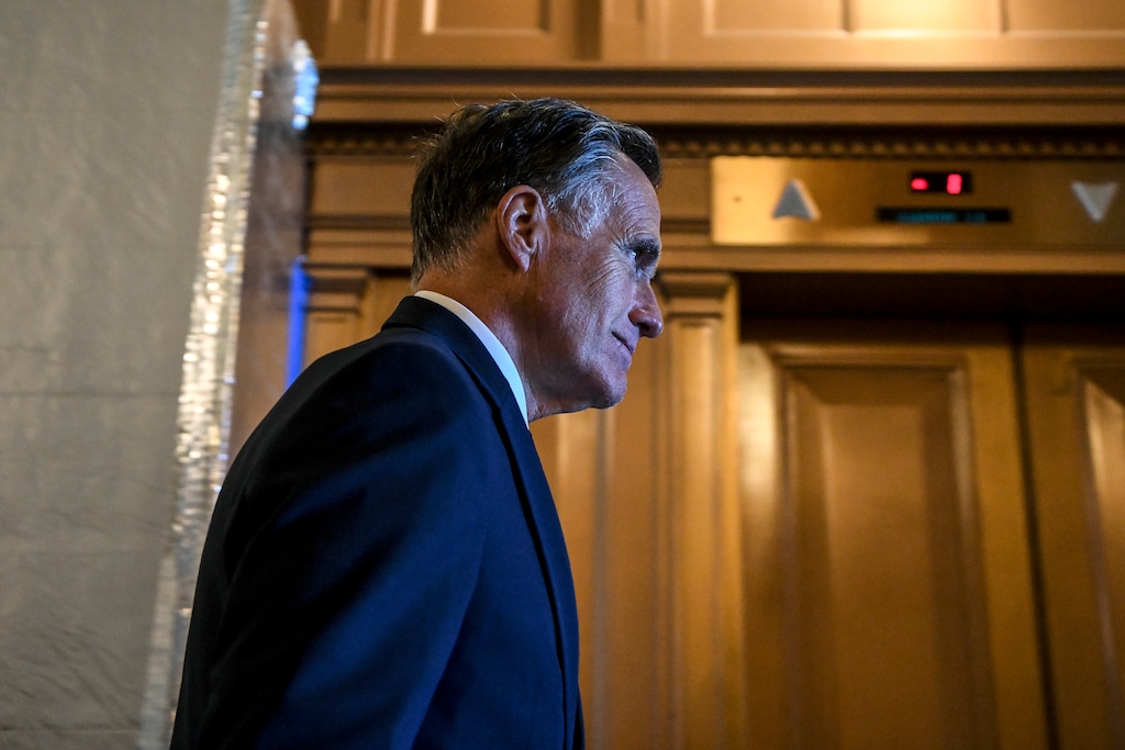 (Kenny Holston | The New York Times) Mitt Romney, R-Utah, departs the Senate chamber after the Senate passed the Inflation Reduction Act on Capitol Hill in Washington on Sunday, Aug. 7, 2022.