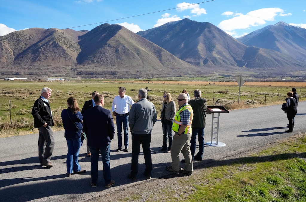 (Francisco Kjolseth | The Salt Lake Tribune) Sen. Mitt Romney, right, joins Utah water managers and state leaders for a tour of a Central Utah Water Completion Act (CUPCA) construction site in South Utah County on Friday, Nov. 12, 2021. The recent infrastructure bill directs $50 million toward this project, which moves water from the Colorado River Basin to Wasatch Front cities.