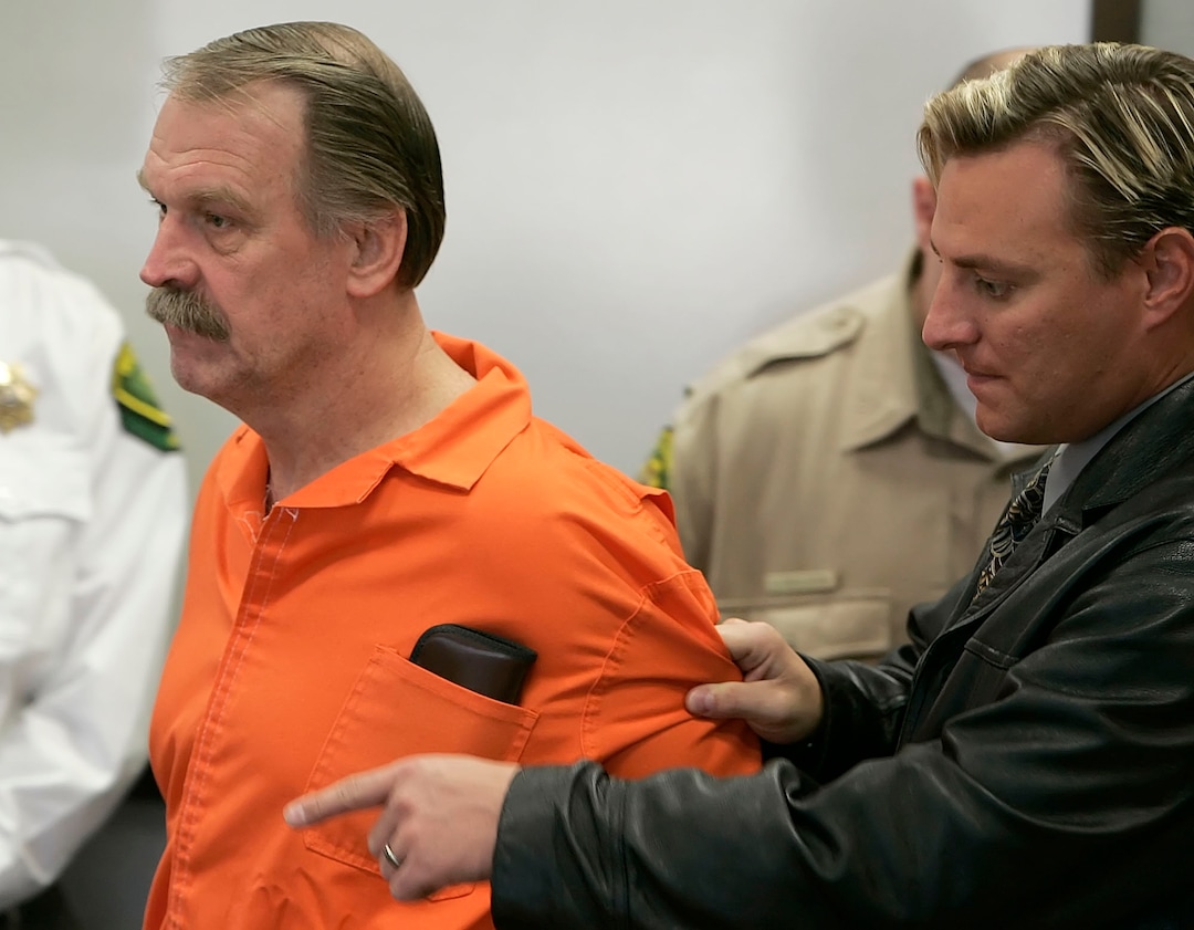 (George Frey  |  AP Photo) Ron Lafferty is lead by security into his court hearing in the 4th District Courtroom of Judge Anthony Schofield in Provo, Utah October 6, 2005.  Lafferty is trying to get his conviction overturned from the 1984 double murders of his sister-in-law and her 15 month old child.