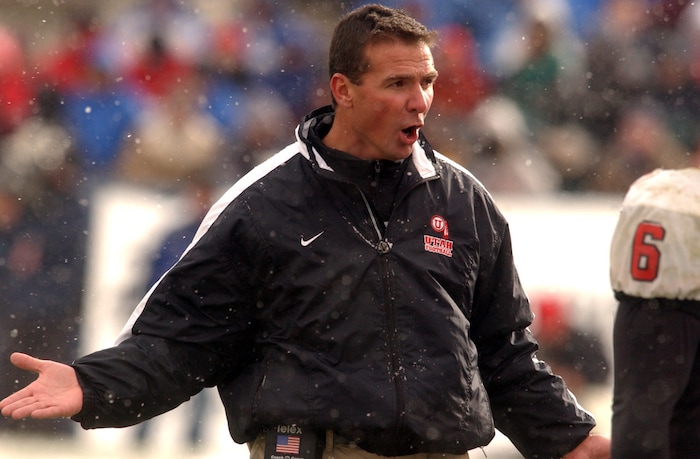 (Rick Egan  |  Tribune file photo)  Utah's Urban Meyer coaches the Utes on a snowy day in Provo against BYU on Saturday November 22, 2003 at LaVell Edwards Stadium.