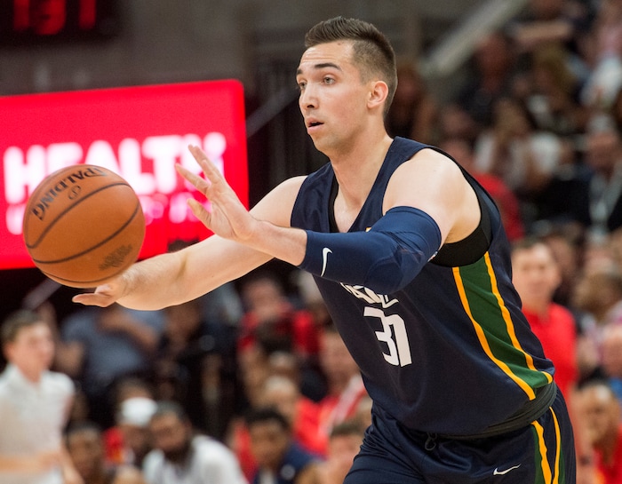 (Rick Egan  |  The Salt Lake Tribune)  Utah forward Zach Thomas tosses a pass for the Jazz, in Utah Jazz summer league action between Utah Jazz and Memphis Grizzlies in Salt Lake City, Tuesday, July 3, 2018.