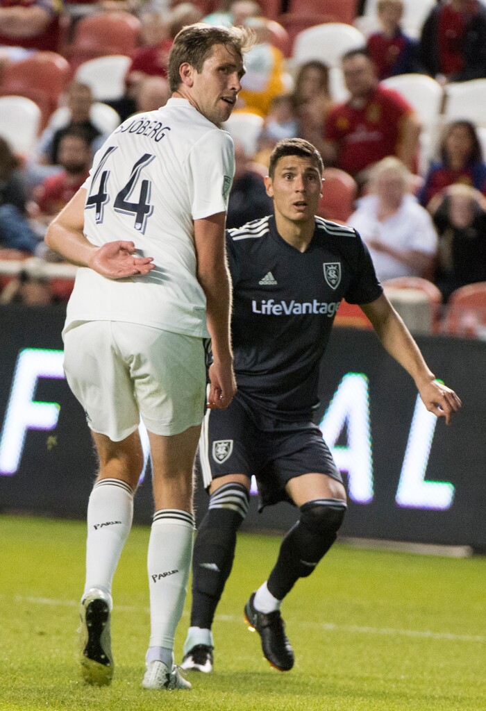 (Rick Egan  |  The Salt Lake Tribune) Real midfielder Damir Kreilach (6) watches his kick land in the net for a goal, as he bends the ball around defender Colorado Rapids defender Axel Sjoberg (44), in MLS soccer action, between Real Salt Lake and Colorado Rapids,  at Rio Tinto Stadium, Saturday, April 21, 2018.


