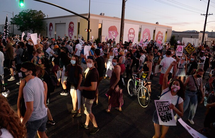 (Francisco Kjolseth  |  The Salt Lake Tribune) Protesters march the streets of downtown Salt Lake City as they congregate at 800 South, 300 West by the mural of George Floyd and other people killed in Utah by police as they rally against police brutality on Friday, June 26, 2020.