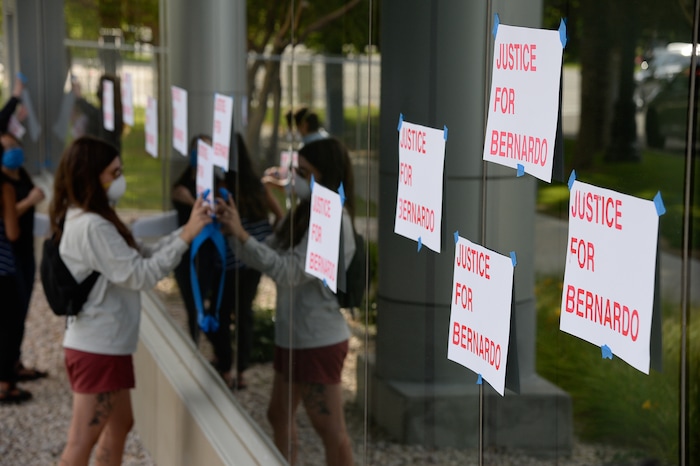 (Francisco Kjolseth  |  The Salt Lake Tribune) Demonstrators gather at the Salt Lake County District Attorney's office as they plaster the building asking for Justice for Bernardo Palacios Rally, on Thursday, June 18, 2020.