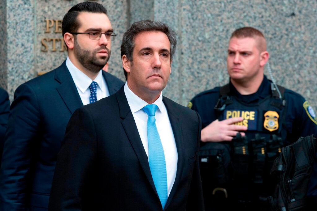 (Mary Altaffer | Associated Press file photo) In this April 16, 2018, file photo, Michael Cohen, President Donald Trump's personal attorney, center, leaves federal court, in New York. Cohen on Wednesday told a federal judge that he would invoke his Fifth Amendment right not to incriminate himself in a lawsuit brought by adult entertainer Stormy Daniels.