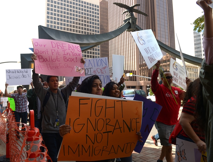(Leah Hogsten  |  The Salt Lake Tribune) Hundreds of “We are Dreamers,” a Utah pro-Deferred Action for Childhood Arrival (DACA) group, marched in solidarity from the Utah Federal Building to the State Capitol with undocumented immigrants who will be affected by the end of DACA. 