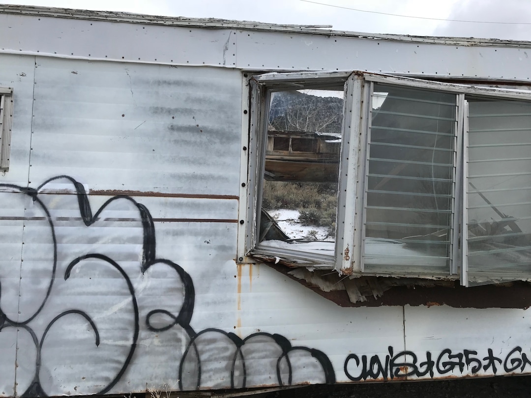 (Paighten Harkins | The Salt Lake Tribune) An abandoned and graffitied mobile home searchers found and searched inside while looking for Riley Powell and Breezy Otteson near Eureka on Feb. 10, 2018.