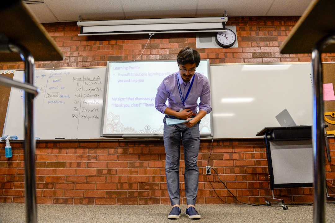 (Leah Hogsten  |  The Salt Lake Tribune) Oquirrh Hills Middle School eighth grade math instuctor Pinyi Yao thanks his students after class ends with a bow on the first day of school. Pinyi Yao, 27, a Chinese National teaching 7th and 8th grade math welcomes his students on their first day of the school year at Oquirrh Hills Middle School, August 20, 2019 in Riverton.