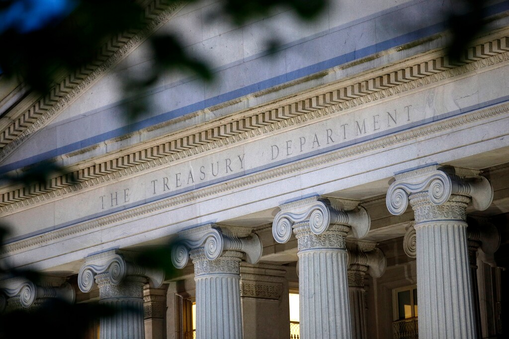 (Patrick Semansky | AP file photo)  This June 6, 2019, photo shows the U.S. Treasury Department building at dusk in Washington.