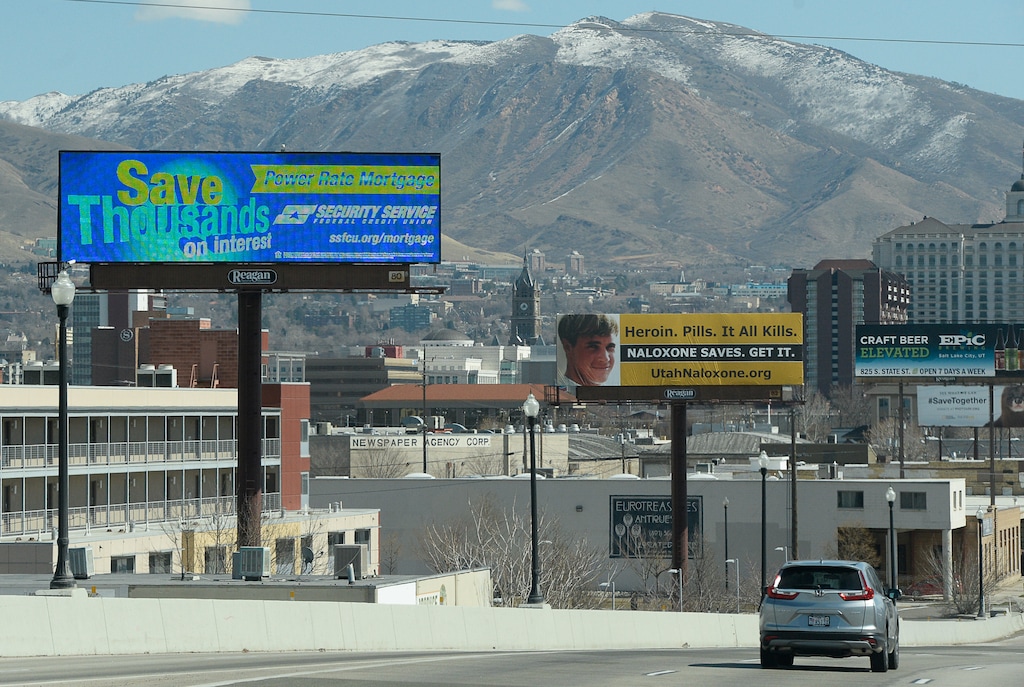 (Francisco Kjolseth | The Salt Lake Tribune) Billboards are stacked along the 600 South offramp from I-15 in Salt Lake City on Tuesday, March 13, 2018.
