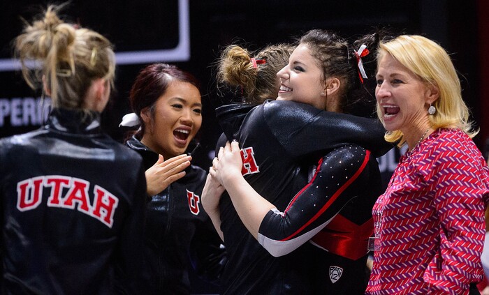 Trent Nelson  |  The Salt Lake TribuneUtah's Samantha Partyka celebrates with teammates after her floor routine as the University of Utah hosts Arizona, NCAA gymnastics at the Huntsman Center in Salt Lake City, Monday February 1, 2016. Coach Megan Marsden at right.