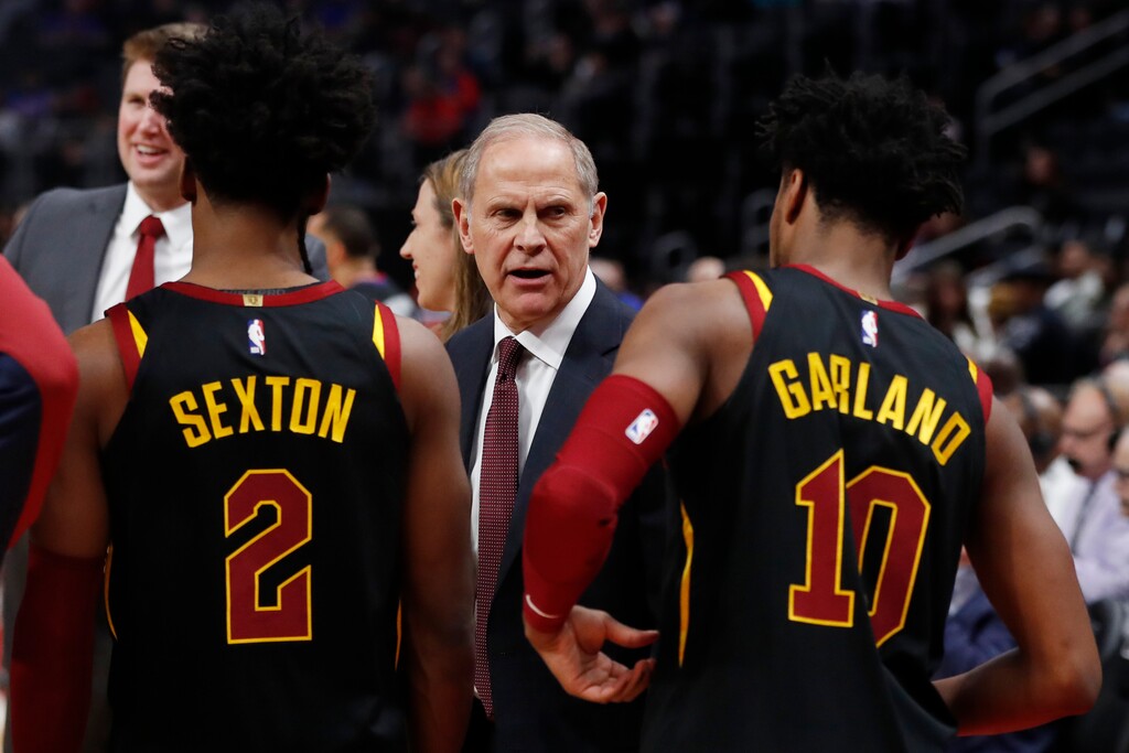 Cleveland Cavaliers coach John Beilein talks with guards Collin Sexton (2) and Darius Garland (10) during the first half of an NBA basketball game against the Detroit Pistons, Thursday, Jan. 9, 2020, in Detroit. (AP Photo/Carlos Osorio)
